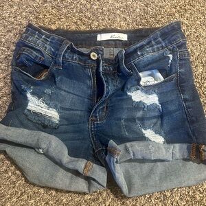 Buckle Kancan denim mid rise cuff short.